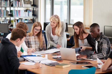 Classroom of students being taught by teacher