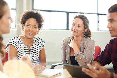 A group of people having a meeting